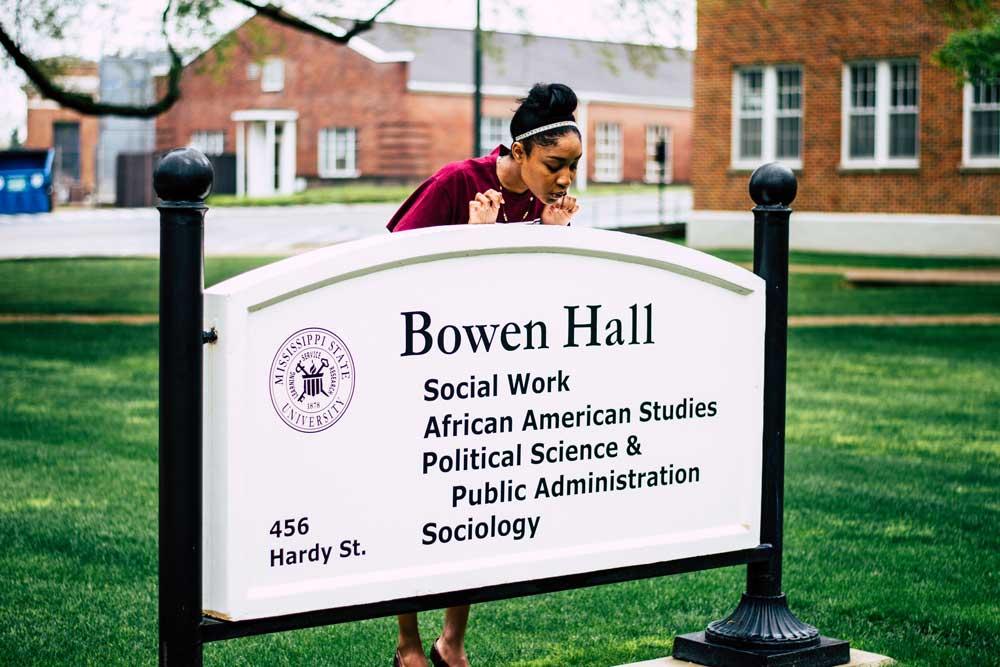Samantha McGrew takes one more look at the sign marking Bowen Hall